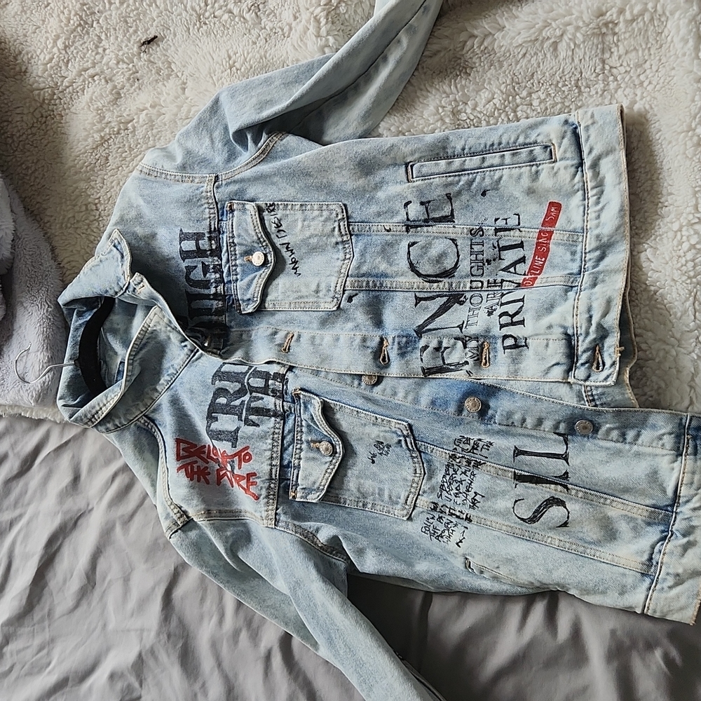 Distressed washed denim jacket